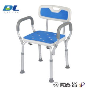 An elderly woman using a silver adjustable shower chair safely in her bathroom, showing the chair's back support and stable legs.