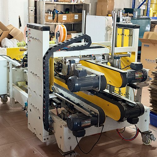 Automatic carton sealer preparing shipping boxes for international orders