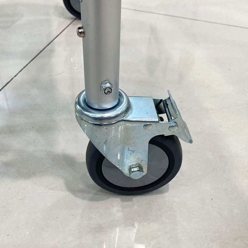 Caster wheel detail of DL 6022 3 in 1 commode chair for smooth indoor movement